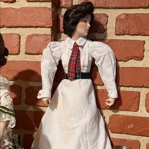 Porcelain Doll in White Dress with Plaid Accent